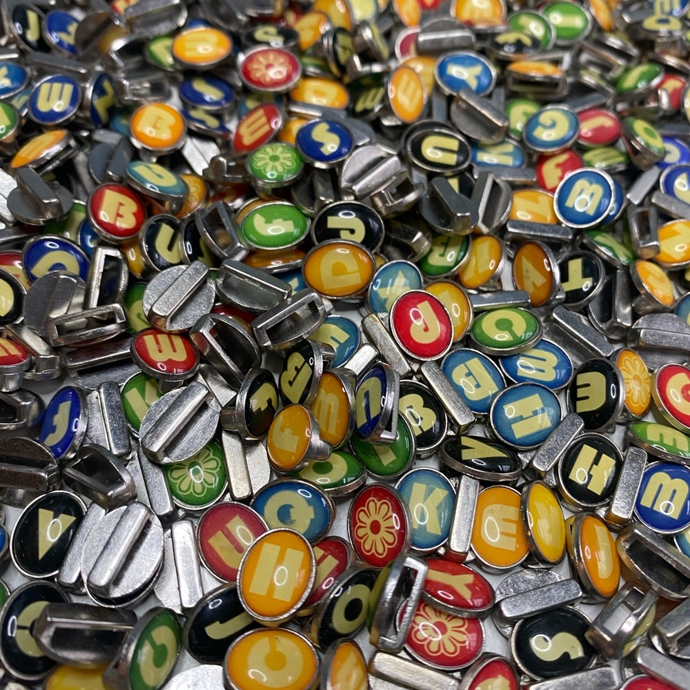 Slider charms Huge Mixed lot alphabet and flowers.